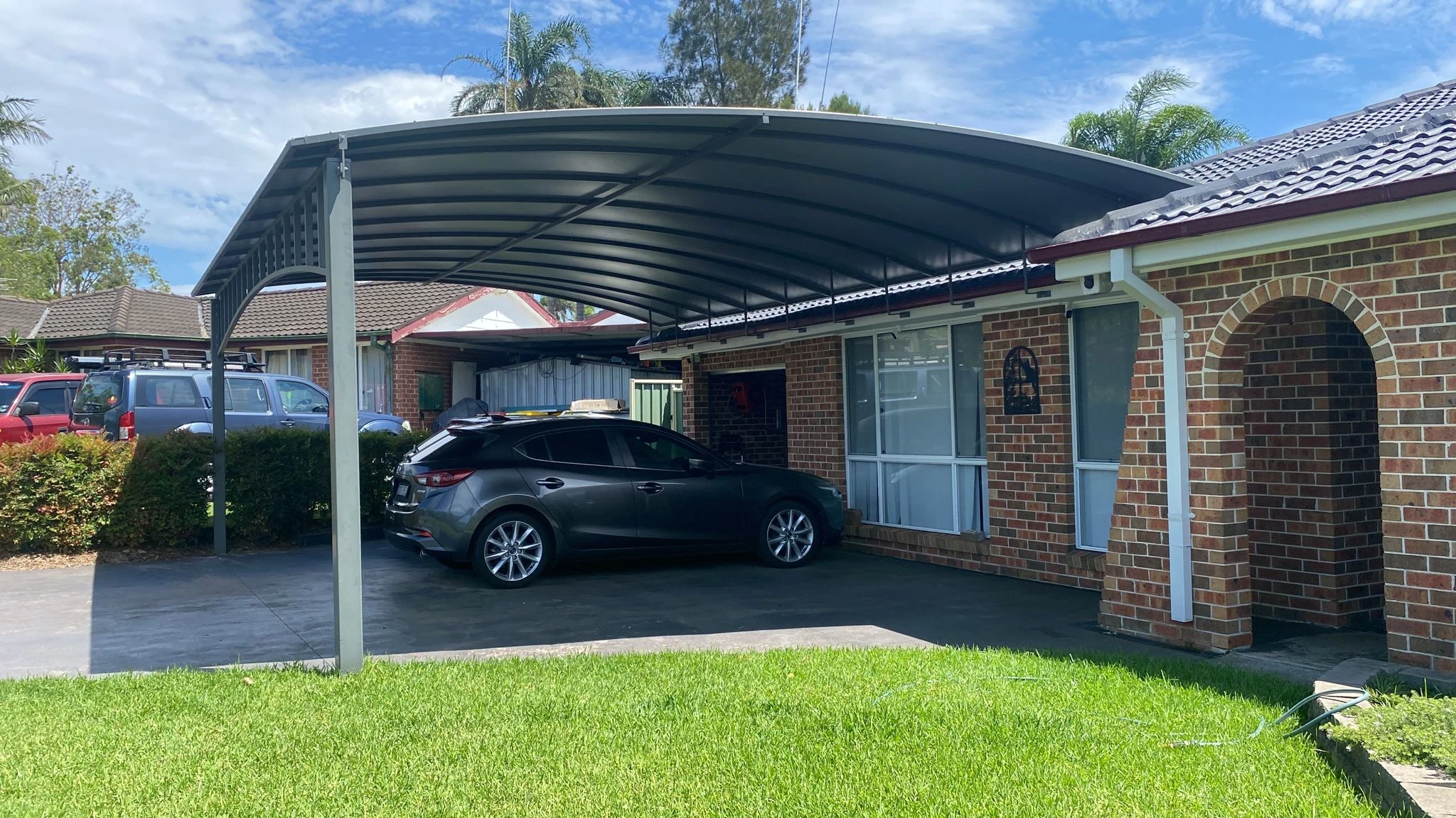 Curved carport modern architecture